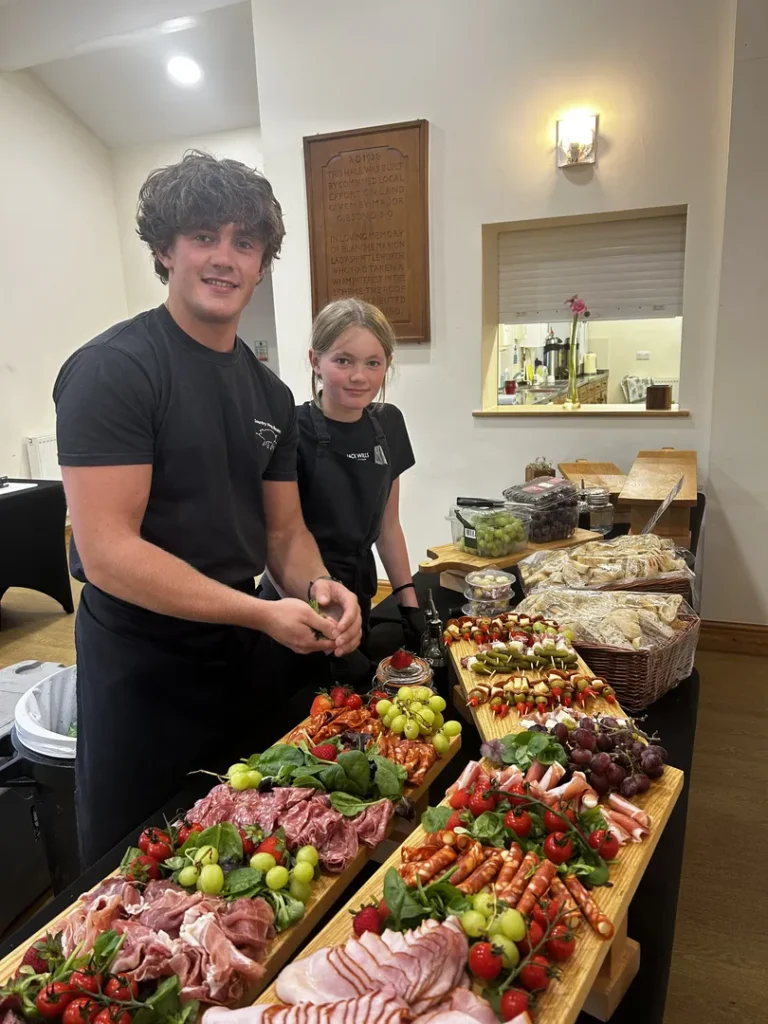 Country Hog Roast Staff preparing wedding catering food.